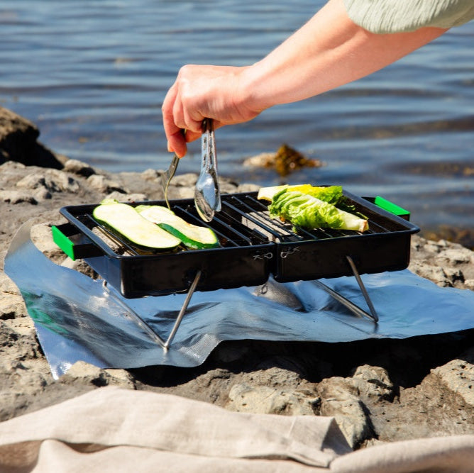 Less Trash minigrill er perfekt til strand- og piknikturer.